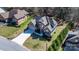 An aerial view of a well-maintained brick home with a long driveway and manicured lawn at 3815 10Th Ne St, Hickory, NC 28601