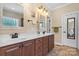 Bathroom offers a double vanity with modern faucets and cabinetry at 3815 10Th Ne St, Hickory, NC 28601
