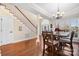 Open concept dining area and foyer with hardwood floors and a staircase at 3815 10Th Ne St, Hickory, NC 28601