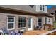 A wooden deck provides outdoor space, adorned with furniture and potted plants at 3815 10Th Ne St, Hickory, NC 28601