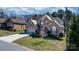 Charming two-story brick home with a well-manicured lawn and a driveway leading to an attached garage at 3815 10Th Ne St, Hickory, NC 28601