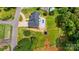 Bird's-eye view of home with a private pool, well-manicured lawn, and proximity to neighborhood street at 4808 1St Nw St, Hickory, NC 28601