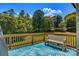 Enjoy the scenic view from the deck with plenty of trees and blue skies at 4808 1St Nw St, Hickory, NC 28601