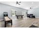 Large game room with ample space for shuffleboard and a door to the outside at 4808 1St Nw St, Hickory, NC 28601