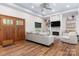 Inviting living room with hardwood floors, stone fireplace, and ample seating at 4808 1St Nw St, Hickory, NC 28601