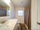 Bathroom with large vanity, neutral paint, a toilet, and a shower with a curtain at 5743 Cherrycrest Ln, Charlotte, NC 28217