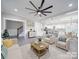 Spacious open-concept living area with combined living, dining, and kitchen, perfect for entertaining and Gathering gatherings at 588 Washington Ln, Albemarle, NC 28001