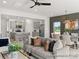 Bright living room featuring an open-concept layout with seamless access to the kitchen and dining area at 602 Station St # 39, Clover, SC 29710