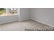 New construction bedroom with carpet and a window overlooking neighborhood construction at #603 Mt. Mitchell Ave # 603, Gastonia, NC 28052