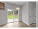 The dining area features light wood floors, a pendant light, and sliding glass doors to the backyard at #603 Mt. Mitchell Ave # 603, Gastonia, NC 28052