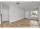 Bright living room boasts hardwood floors and a large window for ample natural light at #603 Mt. Mitchell Ave # 603, Gastonia, NC 28052