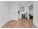 Finished basement bar area with a wine cooler and ample storage space at 621 Poindexter Dr, Charlotte, NC 28209