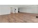 Spacious basement with hardwood floors, neutral walls, recessed lighting, and access to a bathroom at 621 Poindexter Dr, Charlotte, NC 28209