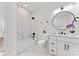 Elegant bathroom with marble accents, modern fixtures, and a sleek vanity at 621 Poindexter Dr, Charlotte, NC 28209