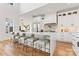 Bright, open kitchen featuring a large island with seating and modern appliances at 621 Poindexter Dr, Charlotte, NC 28209