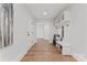 Functional mudroom entrance with built-in bench seating and storage hooks at 621 Poindexter Dr, Charlotte, NC 28209
