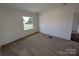 Bright bedroom with neutral carpet and natural light from a window at 7051 Maple Glen Dr, Catawba, NC 28609