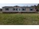 Charming single-story home with light-colored siding, blue shutters, and a well-maintained lawn at 7051 Maple Glen Dr, Catawba, NC 28609