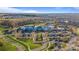 Aerial view of community clubhouse, showcasing its amenities and expansive parking at 7127 Hanging Rock Ct, Denver, NC 28037