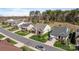 Beautiful street view of well-maintained homes with manicured lawns in a suburban neighborhood at 7127 Hanging Rock Ct, Denver, NC 28037
