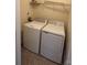Convenient laundry room with a modern washer and dryer set at 7141 Adare Mews Rd, Charlotte, NC 28217
