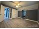 This spacious bedroom boasts neutral walls, ceiling fan and closet at 7310 Yorkville Ct, Charlotte, NC 28273