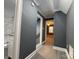 Hallway with views to bathroom and bedroom with ceiling fan at 7310 Yorkville Ct, Charlotte, NC 28273