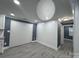 Bright living space with luxury vinyl plank flooring, recessed lighting, and open layout design at 7310 Yorkville Ct, Charlotte, NC 28273
