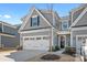 Charming gray two-story home with a white garage door and well-maintained landscaping at 781 Hazel Way, Denver, NC 28037