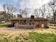 Rear exterior of brick home with large deck and spacious backyard at 905 Kemper Cir, Rock Hill, SC 29732