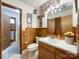 Charming bathroom featuring a vanity, toilet, and decorative fixtures at 905 Kemper Cir, Rock Hill, SC 29732