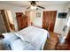 Bedroom with hardwood floors, a ceiling fan, and closet doors at 905 Kemper Cir, Rock Hill, SC 29732