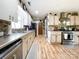 Long galley kitchen with stainless steel appliances, ample counter space, and an open concept design at 905 Kemper Cir, Rock Hill, SC 29732