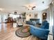 Open concept living area featuring hardwood floors, comfortable seating, and a ceiling fan at 905 Kemper Cir, Rock Hill, SC 29732