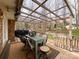 Covered back patio with dining set and grill, perfect for entertaining at 905 Kemper Cir, Rock Hill, SC 29732