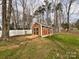 Storage shed on a lush, tree-filled lot at 905 Kemper Cir, Rock Hill, SC 29732