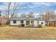 Expansive backyard featuring a patio with furniture, ideal for outdoor gatherings and relaxation at 914 Crestmere St, Charlotte, NC 28208