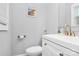 Bright powder room features a white vanity, modern fixtures, and stylish wall decor at 914 Crestmere St, Charlotte, NC 28208