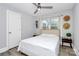 Bedroom featuring neutral color palate, modern ceiling fan, and ample natural light at 914 Crestmere St, Charlotte, NC 28208