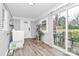 Bright laundry area with washer, dryer, sliding glass doors to patio at 914 Crestmere St, Charlotte, NC 28208