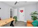 Bright home office with hardwood floors, a comfortable leather couch, and interior decor at 914 Crestmere St, Charlotte, NC 28208