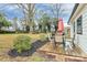 Cozy patio with a grill and outdoor seating perfect for enjoying the backyard at 914 Crestmere St, Charlotte, NC 28208
