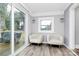 Cozy sunroom with a view of the backyard and space for relaxing at 914 Crestmere St, Charlotte, NC 28208
