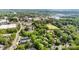 Beautiful aerial view of the neighborhood with lush greenery and charming homes, plus water tower at 917 Bobby Ln, Charlotte, NC 28211