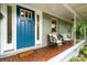 Inviting front porch with two chairs, perfect for enjoying the outdoors at 917 Bobby Ln, Charlotte, NC 28211