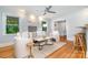 Cozy living room with hardwood floors, stylish decor, and comfortable seating arrangement at 917 Bobby Ln, Charlotte, NC 28211