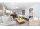 Inviting living room featuring comfortable seating, neutral colors, and natural light at 917 Bobby Ln, Charlotte, NC 28211