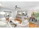 Open-concept living space with a kitchen, dining area, and living room with hardwood floors at 917 Bobby Ln, Charlotte, NC 28211