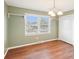 Bedroom featuring a light fixture, wood flooring, and shelving at 108 Colonial Dr, Kings Mountain, NC 28086