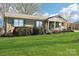 Charming brick home with a well-manicured lawn and inviting front porch perfect for relaxation at 108 Colonial Dr, Kings Mountain, NC 28086
